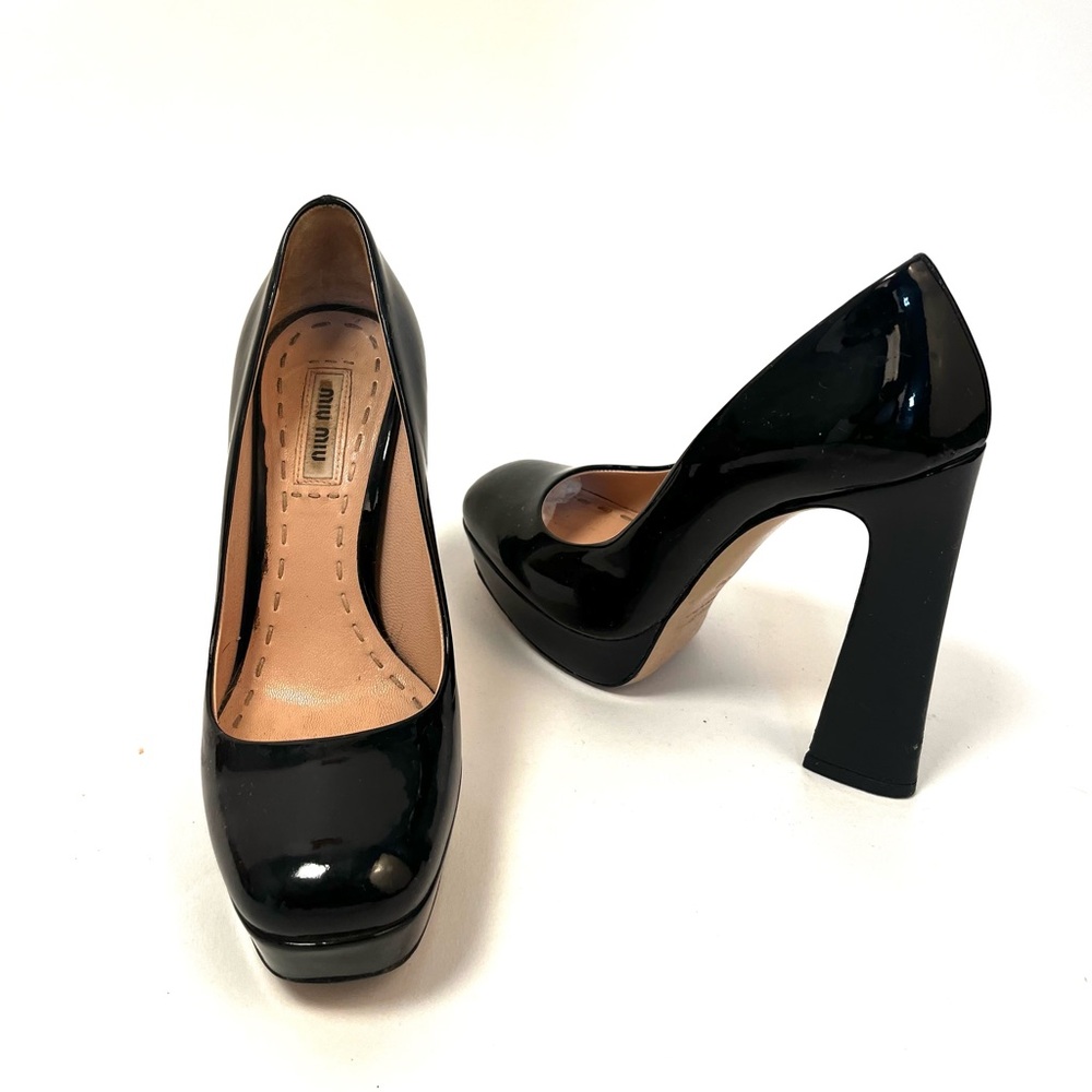 MIU MIU extra high platform patent pumps 36